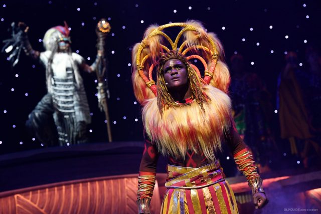 Rafiki and Simba in The Lion King: Rhythms of the Pride Lands musical stage show at Disneyland Paris